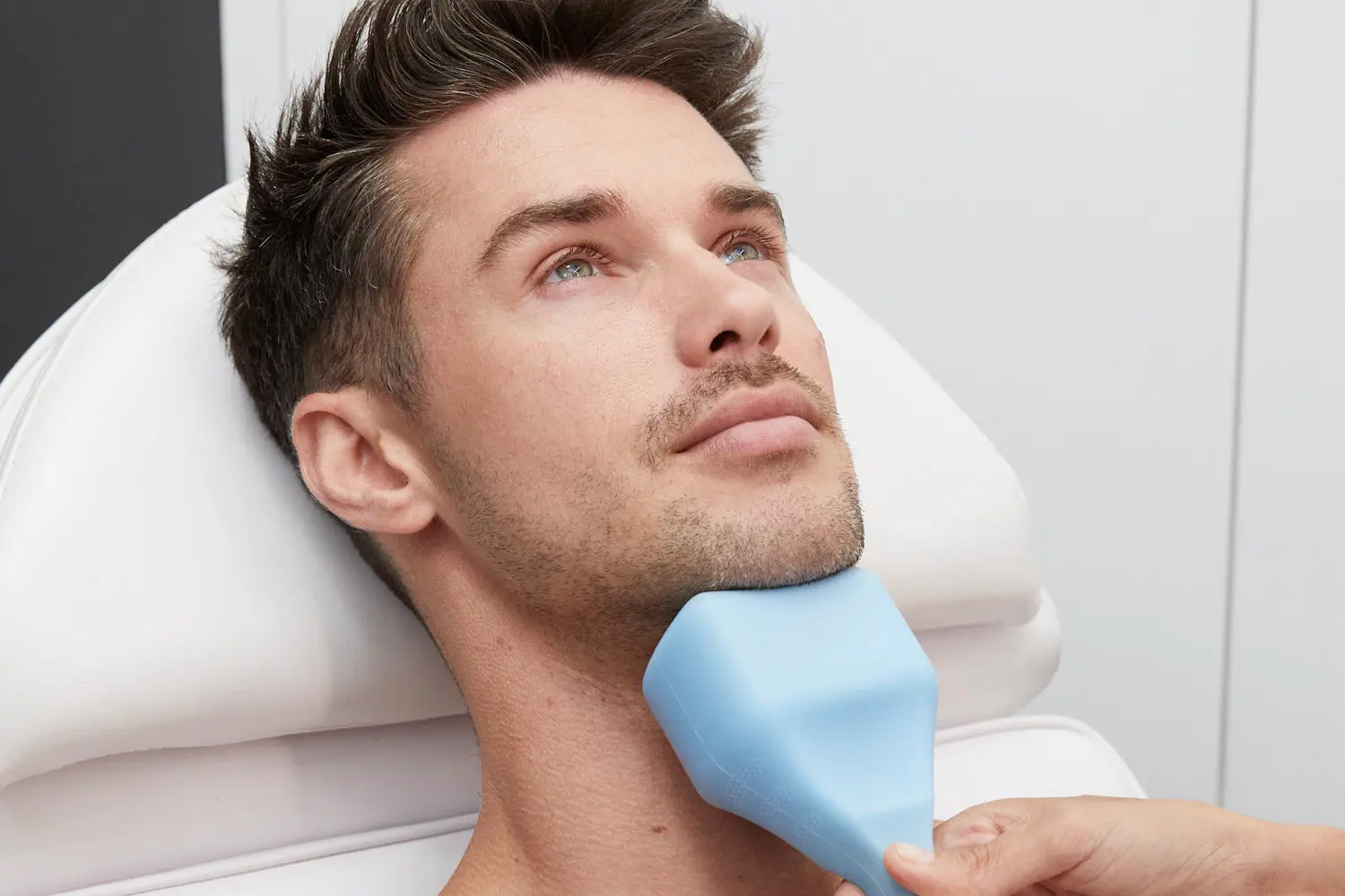 Men receiving Cheek and chin implant