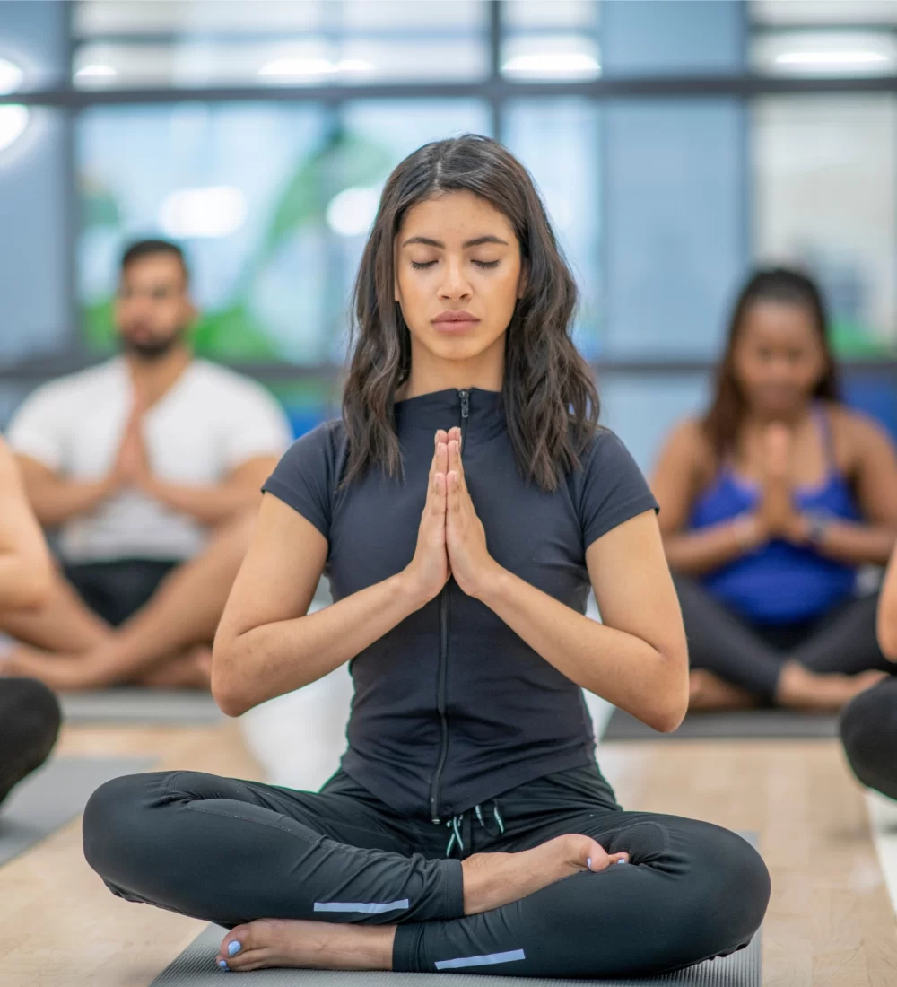 Women receiving professional yoga retreats